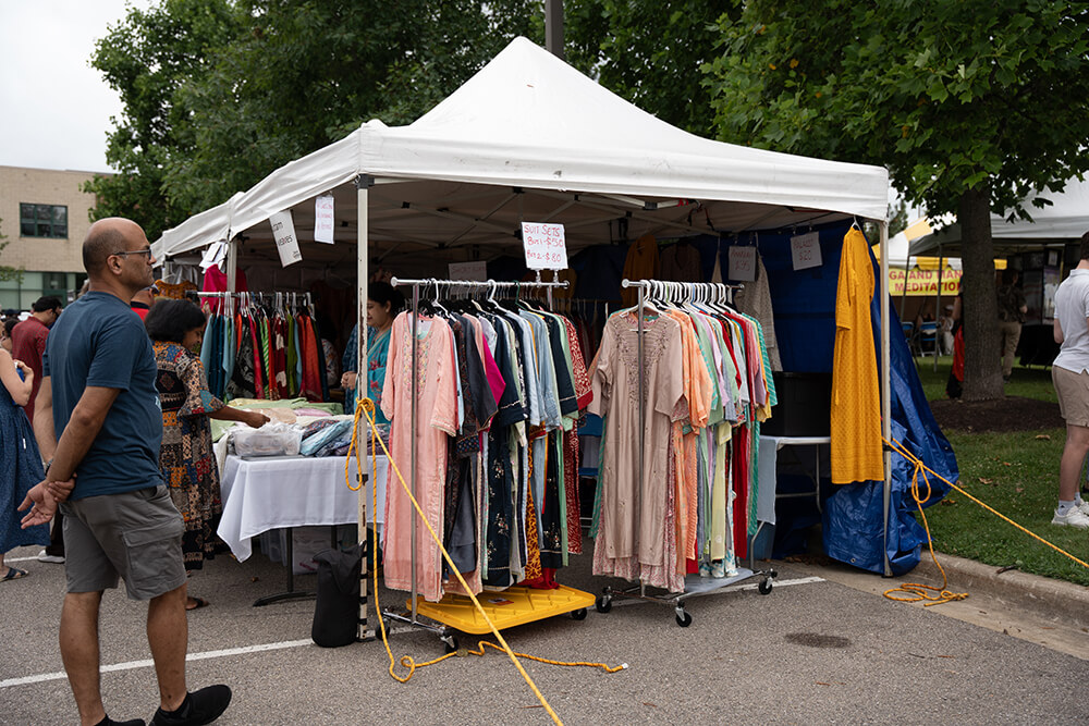 Ethnic clothing and jewelry vendors at the festival bazaar